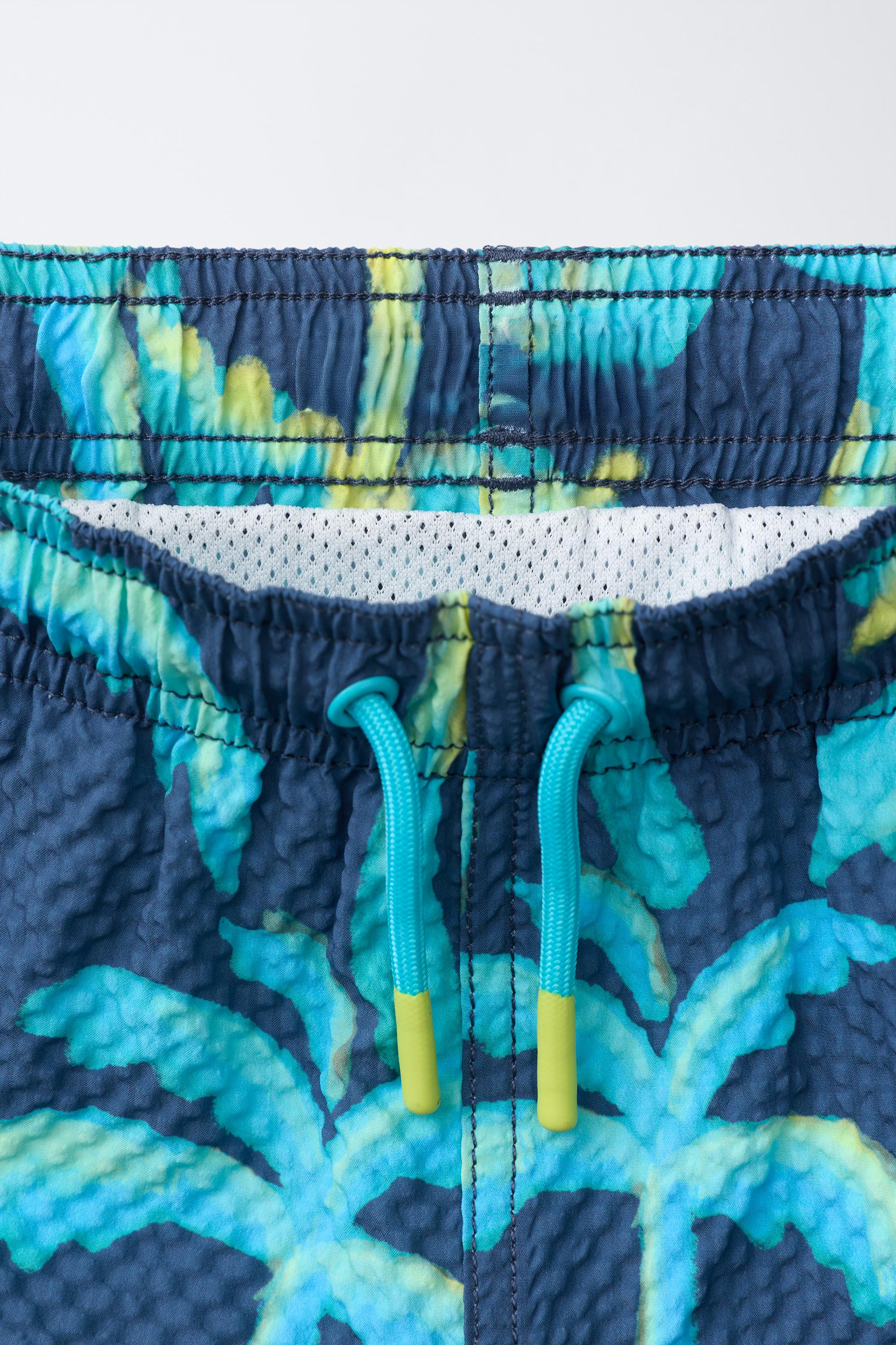 6-14 YEARS/ PALM TREE SWIM SHORTS